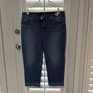 Chico’s Classic Blue Cropped Jeans with fringe and design trim.